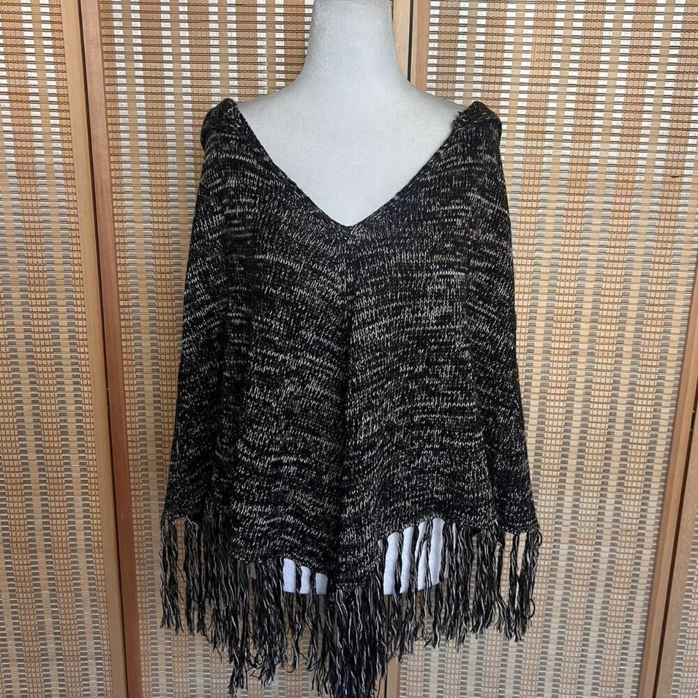 Willow & Clay black and beige fringe poncho sweater with a boho vibe